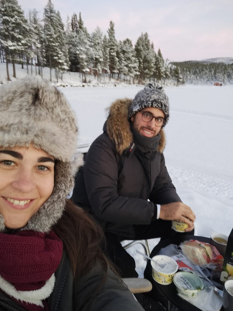 Tiziano and Claudia having breakfast outside the glass igloo.