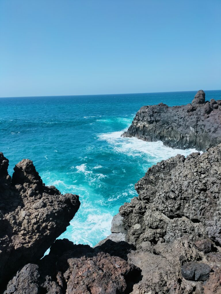 The rocks of Los Hervideros with the sea crashing on the rocks.