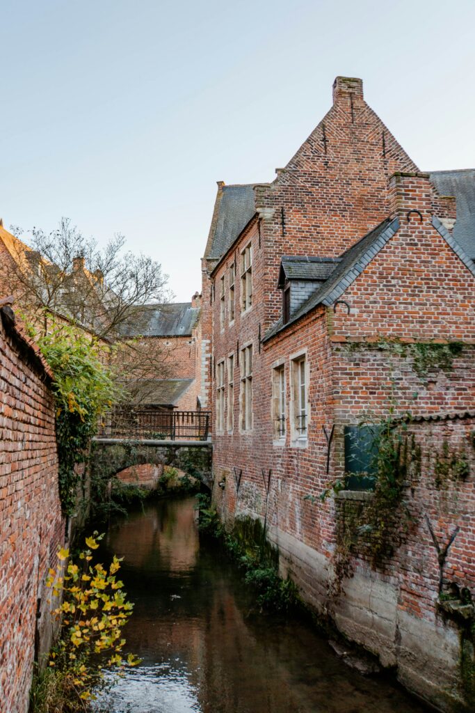 The Great Beguinage (Groot Begijnhof) area. A small river passing through the city.