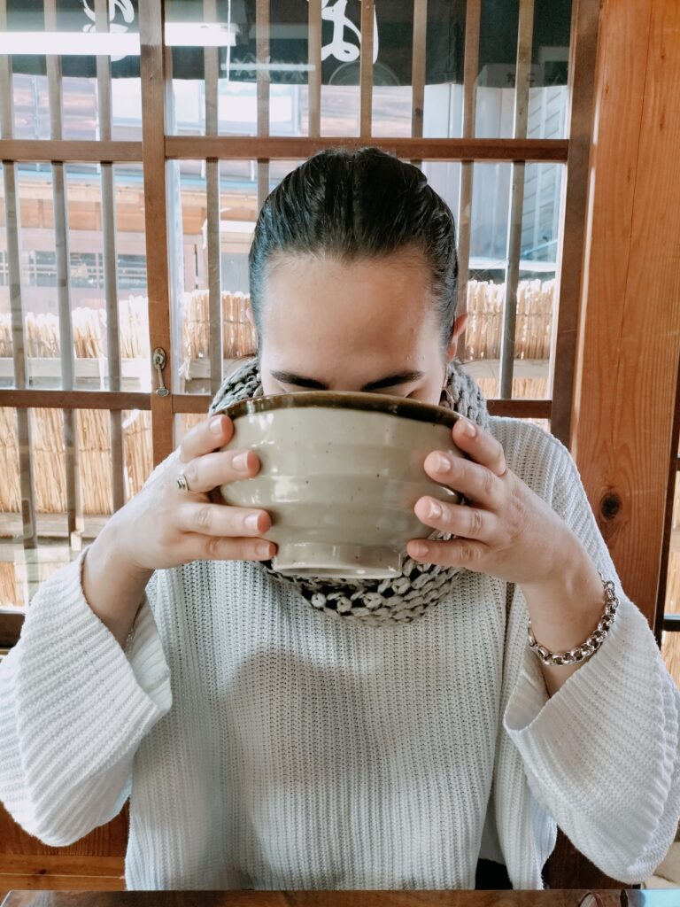 Claudia eating from the bowl.