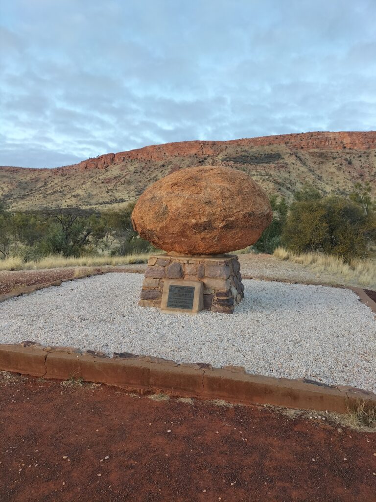 Flynn’s Grave Memorial with MacDonnell Ranges in the background.