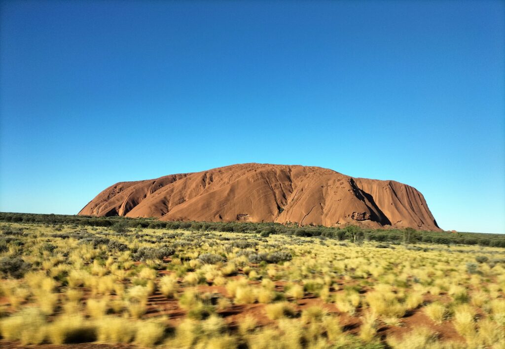 Front view of Uluru during sunset.