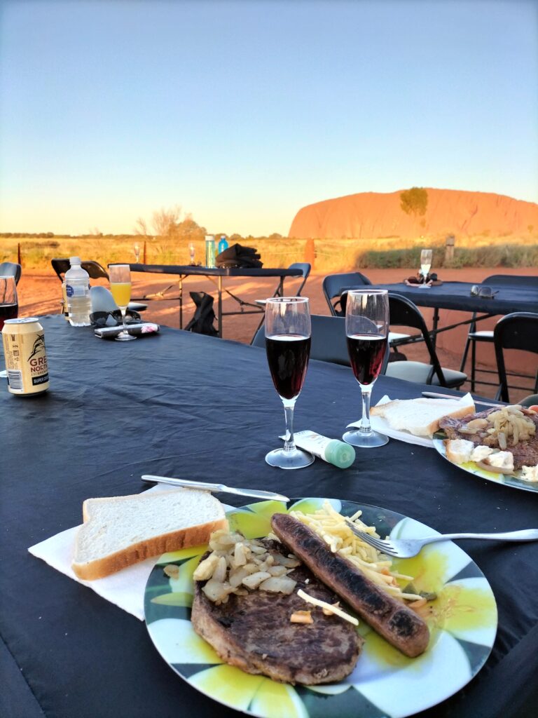 My plate with BBQ in Uluru and 2 glasses of red wine.