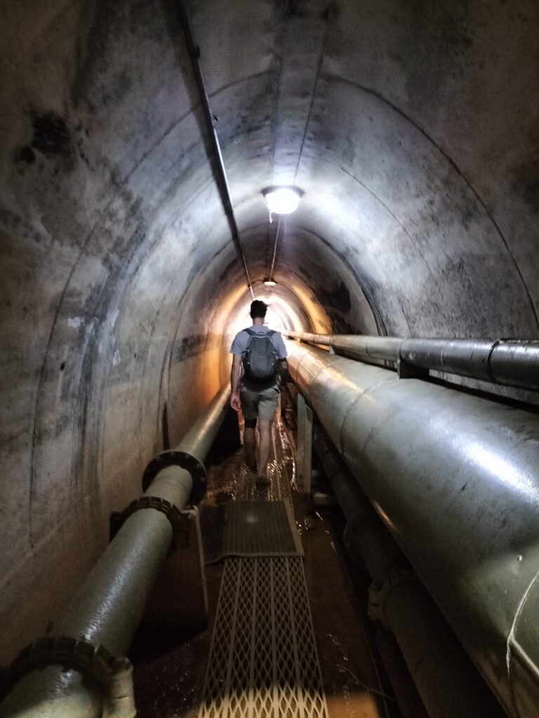 Tiziano walking inside the oil tunnel.