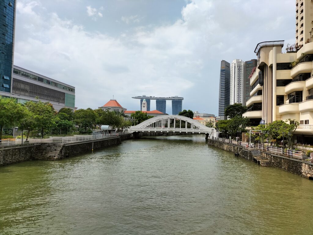 The esplanade with a view of the river and Marina Bay Sands.