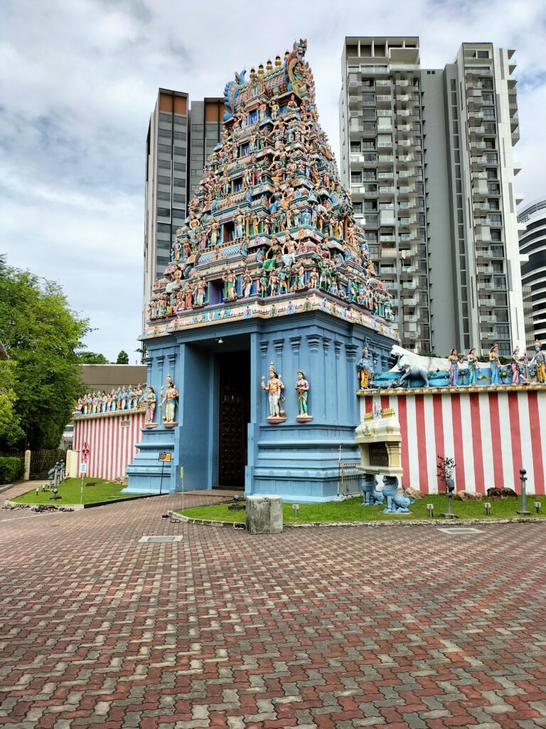 Another indian temple in Little India with buildings behind.