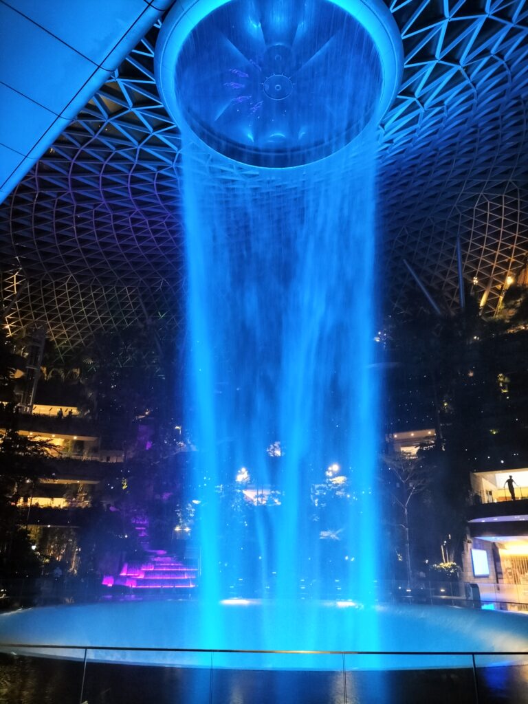 Blue waterfall inside the Terminal 4 of Changi Airport.