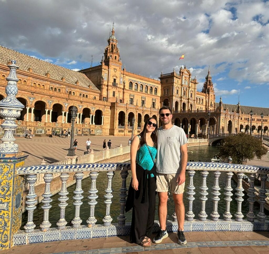 View of Tiziano and Claudia with the Plaza de Espana behind them