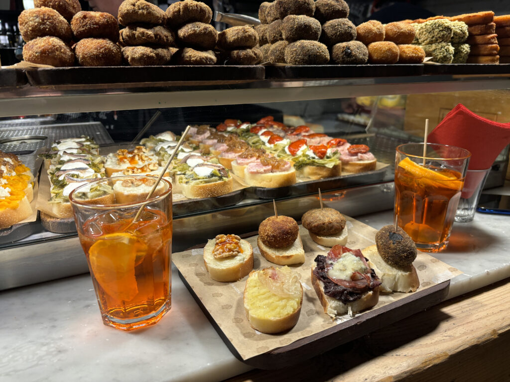 Two spritz with spunciotti at All’Ombra della Piazza in Padua.