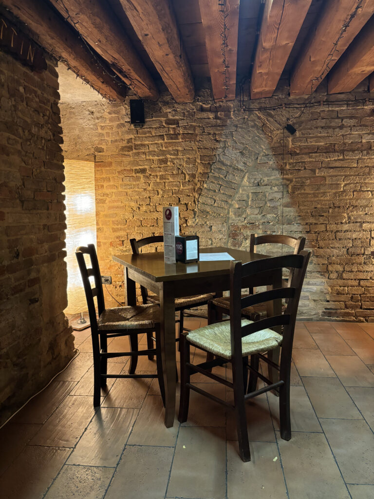 Table inside Il Grottino Restaurant in Vicenza.