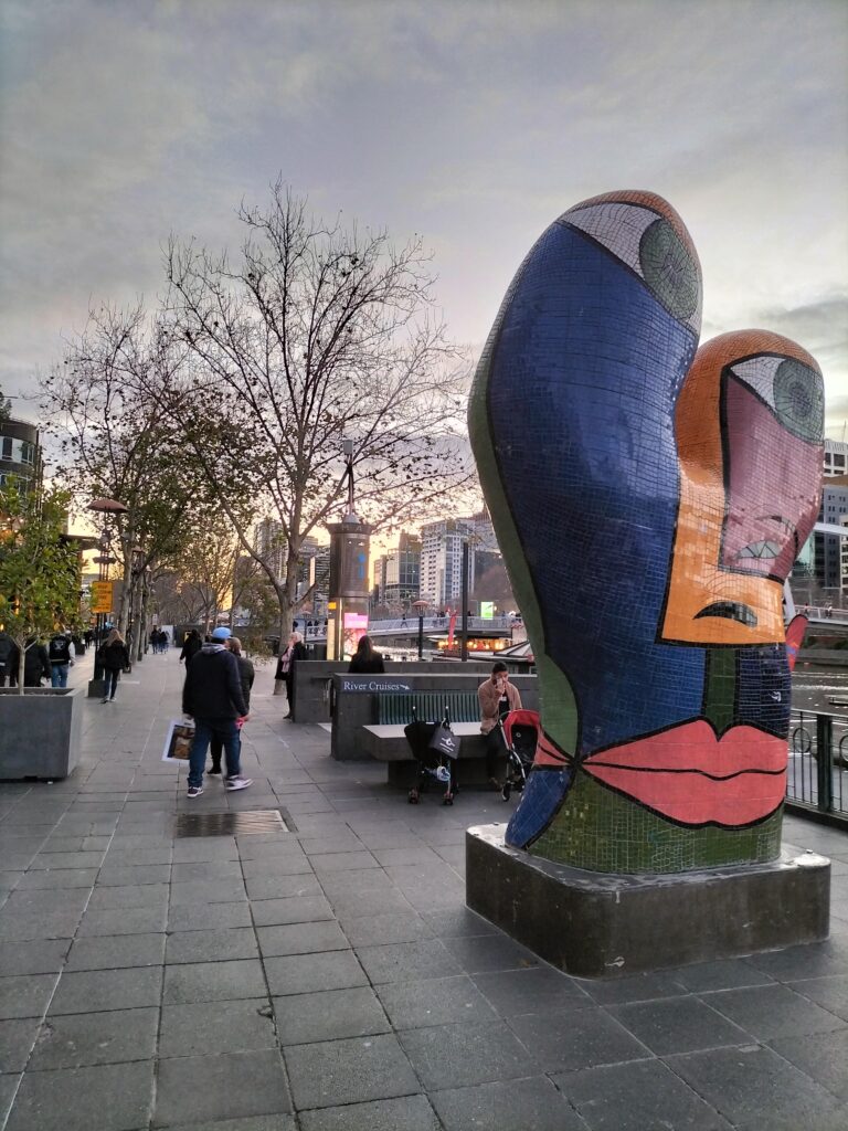 Work of art along the Southbank Promenade with other people.