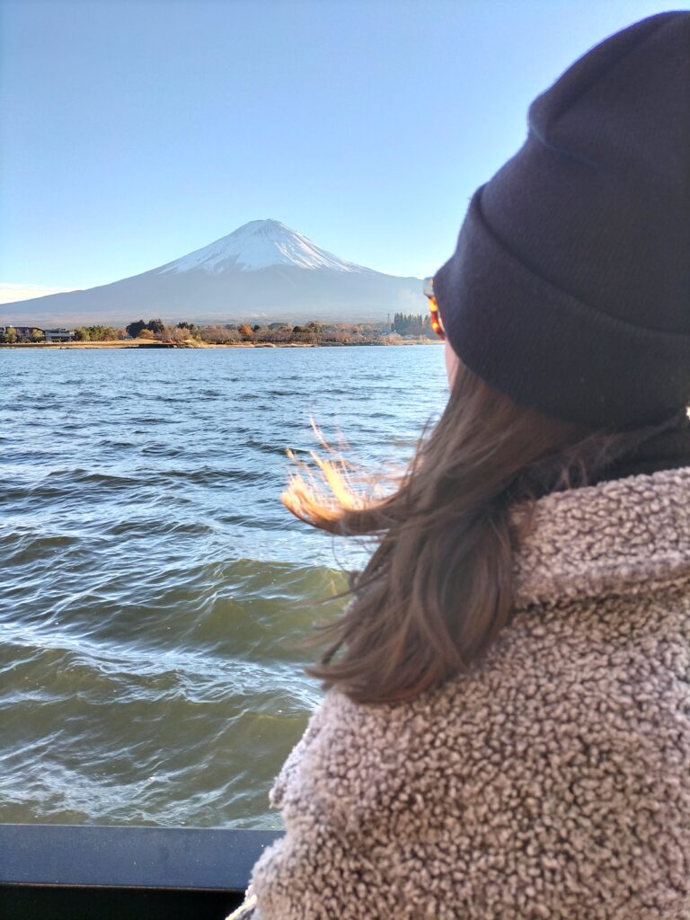 Claudia looking at Mt.Fuji from the boat.